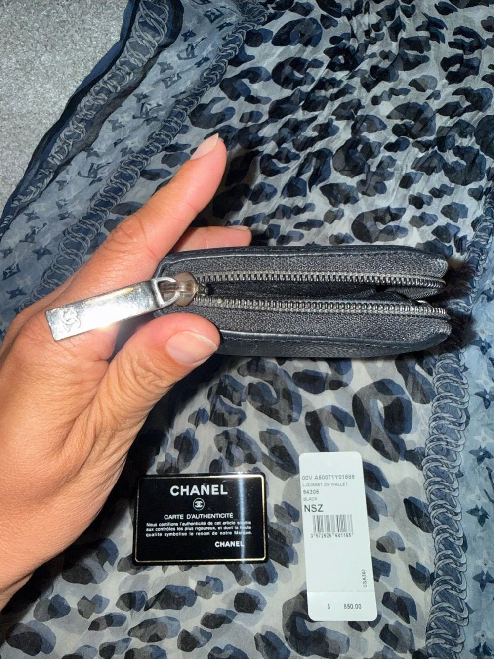 Authentic CHANEL Black Caviar Leather Zip-Around Wallet with Embossed CC